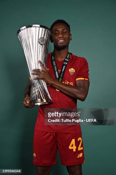 Amadou Diawara of AS Roma poses with the UEFA Europa Conference League Trophy after winning the UEFA Europa Conference League Trophy between AS Roma...