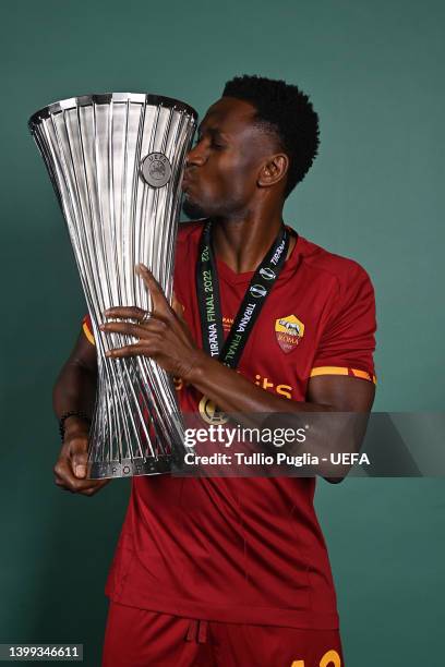 Amadou Diawara of AS Roma poses with the UEFA Europa Conference League Trophy after winning the UEFA Europa Conference League Trophy between AS Roma...