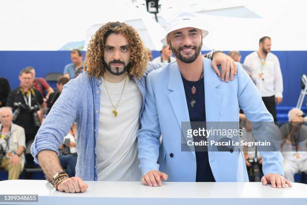 Adil El Arbi and Bilall Fallah attend the photocall for "Rebel" during the 75th annual Cannes film festival at Palais des Festivals on May 26, 2022...