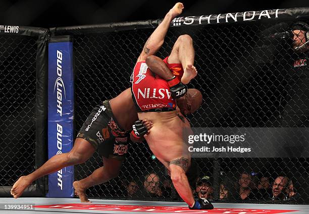 Quinton "Rampage" Jackson slams Ryan Bader during the UFC 144 event at Saitama Super Arena on February 26, 2012 in Saitama, Japan.