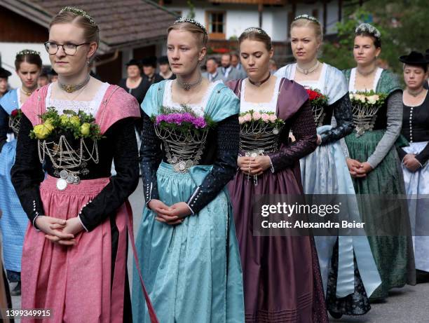 Pilgrims in traditional Bavarian folk dress walk in the annual procession to Birkenstein chapel to mark Ascension on May 26, 2022 near Fischbachau,...