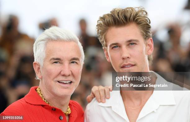 Director Baz Luhrmann and Austin Butler attend the photocall for "Elvis" during the 75th annual Cannes film festival at Palais des Festivals on May...