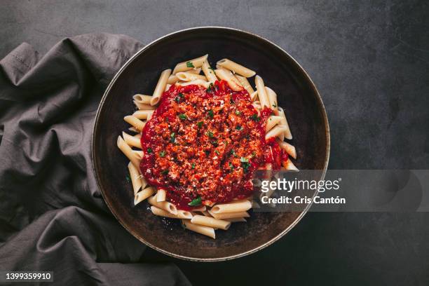penne with bolognese sauce - penne pasta stock pictures, royalty-free photos & images