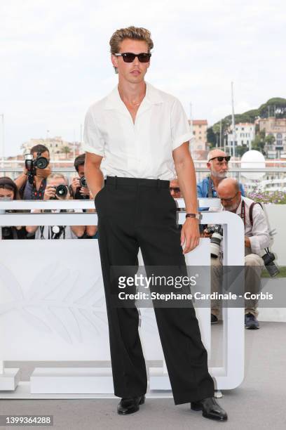 Austin Butler attends the photocall for "Elvis" during the 75th annual Cannes film festival at Palais des Festivals on May 26, 2022 in Cannes, France.