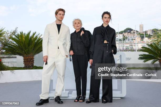 Joe Alwyn, Claire Denis and Margaret Qualley attend the photocall for "Stars At Noon" during the 75th annual Cannes film festival at Palais des...