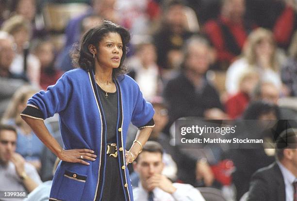 Coach Bernadette Locke-Mattox of the Kentucky Wildcats watches her players during a game against the Georgia Bulldogs at the Stegeman Coliseum in...