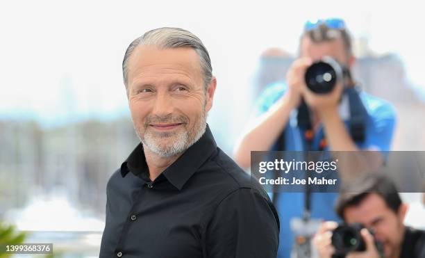 Mads Mikkelsen attends a photocall ahead of the rendez-vous with Mads Mikkelsen event at the 75th annual Cannes film festival at Palais des Festivals...