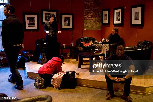 January, 31:Folks gather to pray at Ebenezers Coffeehouse Tuesday January 31, 2012 in Washington, DC. It was the last day of a 21-day prayer vigil...