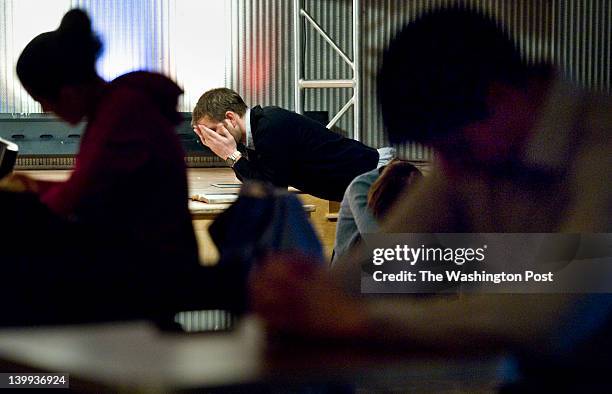 January, 31:Adam Palmer of Arlington prays along with others at Ebenzers Coffeehouse Tuesday January 31, 2012 in Washington, DC. It was his first...