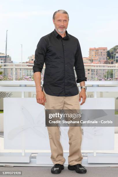 Mads Mikkelsen attends a photocall ahead of the rendez-vous with Mads Mikkelsen event at the 75th annual Cannes film festival at Palais des Festivals...