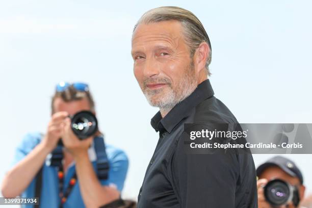 Mads Mikkelsen attends a photocall ahead of the rendez-vous with Mads Mikkelsen event at the 75th annual Cannes film festival at Palais des Festivals...