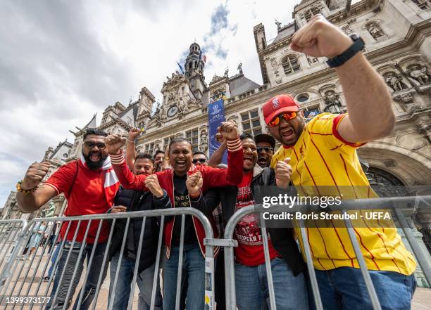 Fans of Liverpool celebrate at Hotel de Ville on day 1 of the UEFA Champions League Final 2021/22 Festival ahead of the UEFA Champions League final...