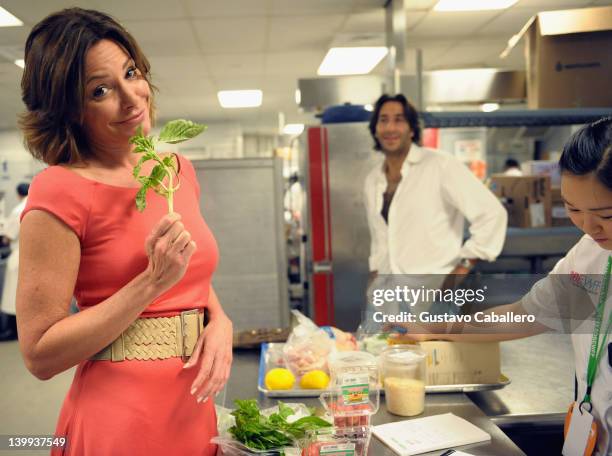 Countess LuAnn de Lesseps and Jacques Azoulay Prepare For South Beach Wine And Food Festival at the Loews Miami Beach on February 25, 2012 in Miami...