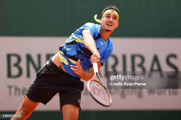 Lorenzo Sonego of Italy serves against Joao Sousa of Portugal during the Men's singles Second Round on Day Five of the 2022 French Open at Roland...