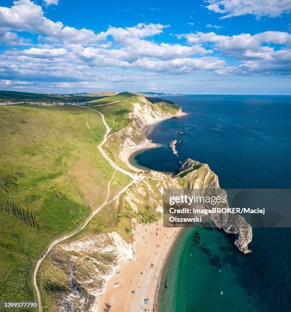 panorama over jurassic coast and clifs, durdle door, wareham, dorset, england, united kingdom - durdle door stock pictures, royalty-free photos & images