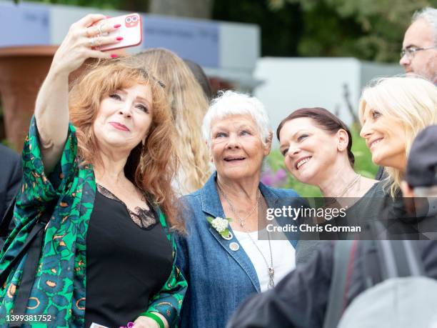 Dame Judi Dench greets fans at the press day of The RHS Chelsea Flower Show on May 23,2022 in London, England.