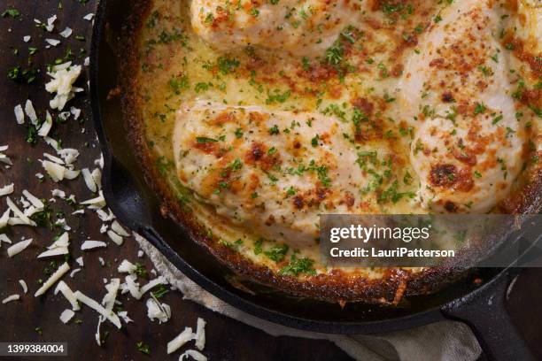 creamy baked parmesan chicken - kalkonbröst bildbanksfoton och bilder