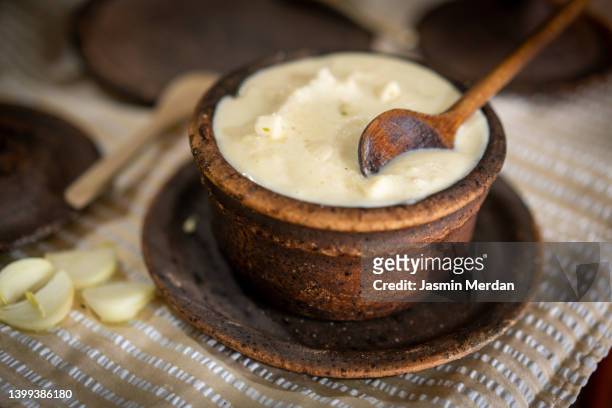 traditional dairy breakfast in clay bowl with wooden spoon - cornmeal stock pictures, royalty-free photos & images