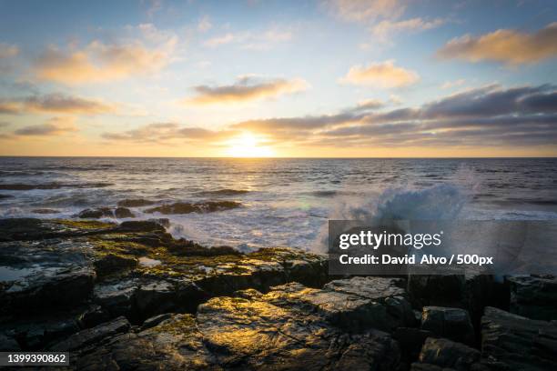 scenic view of sea against sky during sunset - alvo stockfoto's en -beelden