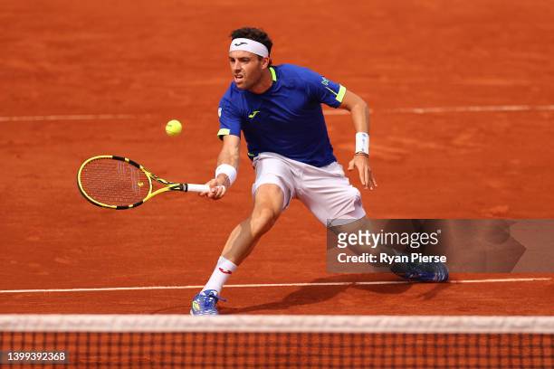 Marco Cecchinato of Italy plays a forehand against Hubert Hurkacz of Poland during the Men's singles Second Round on Day Five of the 2022 French Open...