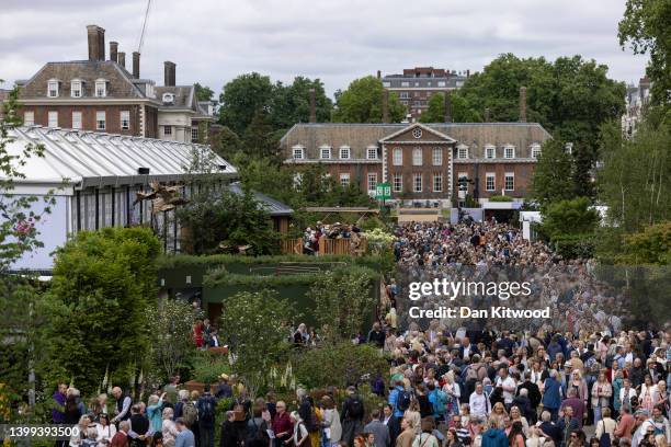 Crowds on the main avenue at Chelsea Flower show on May 26, 2022 in London, England. The Chelsea Flower Show returns to its usual place in the...