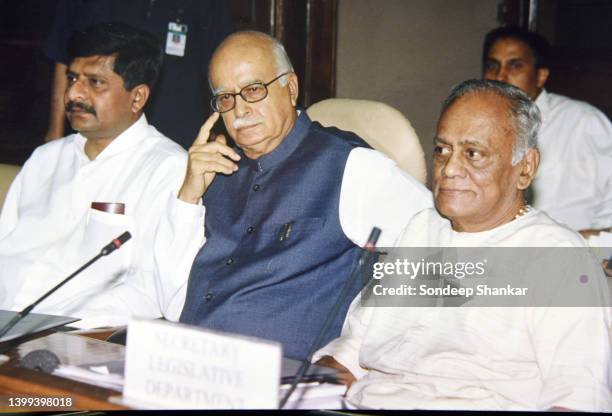 Home Minister LK Advani with newly elected Bhartiya Janta Party President Jana Krishnamurty and minister Ravi Shankar Prasad at a party meeting in...