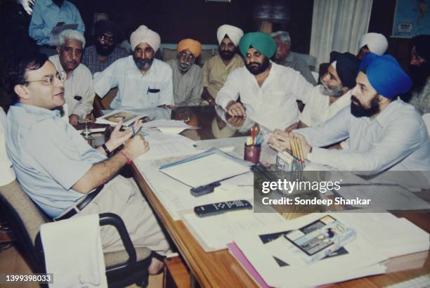 Information and Broadcasting Minister Arun Jaitley meets a delegation of Sikhs at his office in New Delhi on June 29, 2000.