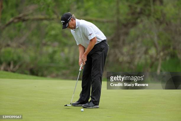 Lee Janzen of the United States putts on the first green during the first round of the Senior PGA Championship presented by KitchenAid at Harbor...