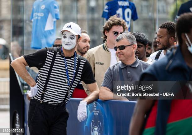 Mime makes jokes with fans at Hotel de Ville on day 1 of the UEFA Champions League Final 2021/22 Festival ahead of the UEFA Champions League final...