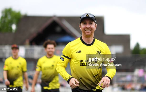 Tom Smith of Gloucestershire takes to the field during the Vitality T20 Blast match between Middlesex and Gloucestershire at Radlett Cricket Club on...