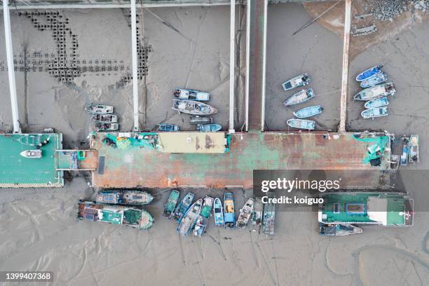 aerial view of the port after low tide - marina beach stock pictures, royalty-free photos & images