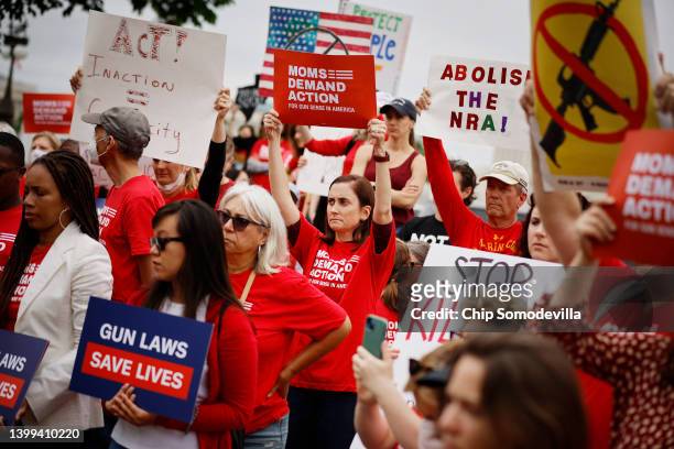 Gun control advocacy groups rally with Democratic members of Congress outside the U.S. Capitol on May 26, 2022 in Washington, DC. Organized by Moms...