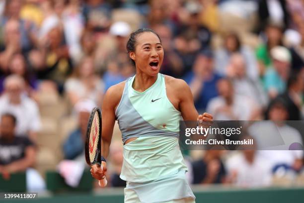 Qinwen Zheng of China celebrates match point against against Simona Halep of Romania during the Women's singles Second Round on Day Five of the 2022...