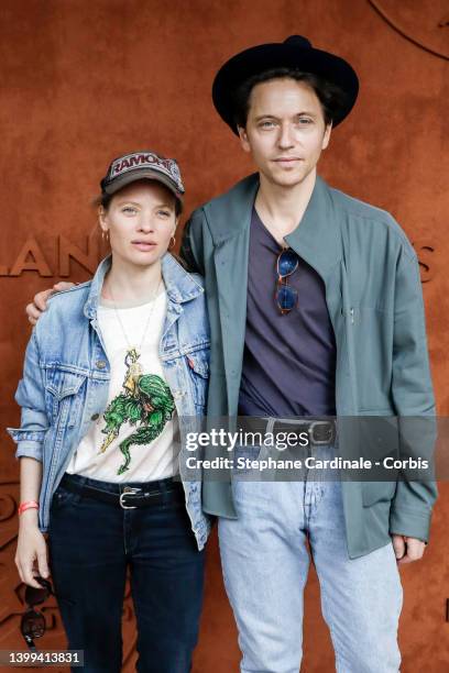 Mélanie Thierry and Raphael Haroche at Roland Garros on May 26, 2022 in Paris, France.