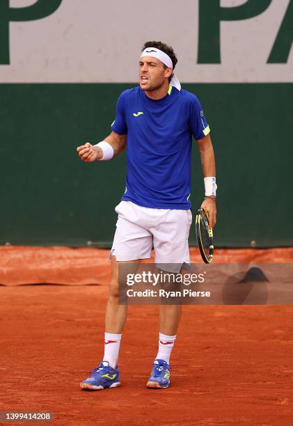 Marco Cecchinato of Italy reacts against Hubert Hurkacz of Poland during the Men's singles Second Round on Day Five of the 2022 French Open at Roland...