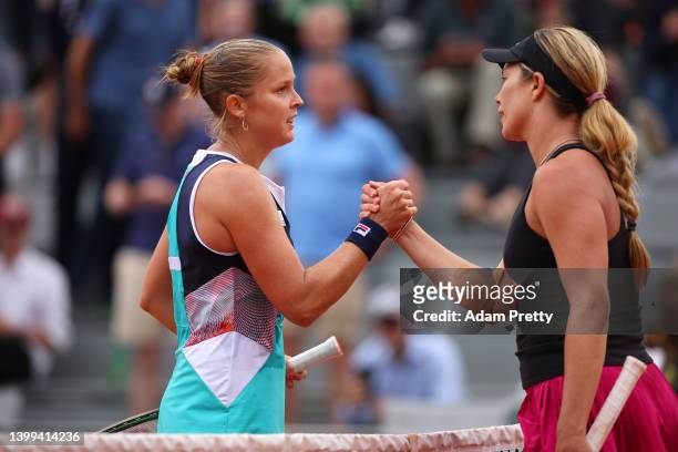 Shelby Rogers of USA shakes hands with Danielle Collins of USA following victory in the Women's singles Second Round on Day Five of the 2022 French...