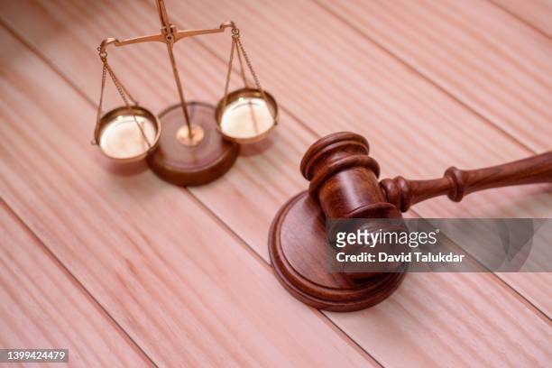 justice scales and wooden gavel - indian crime law and justice stock pictures, royalty-free photos & images