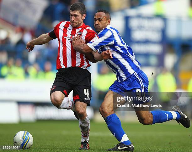 Nick Montgomery of Sheffield United and Chris O'Grady of Sheffield Wednesday challenge for the ball during the npower League One match between...