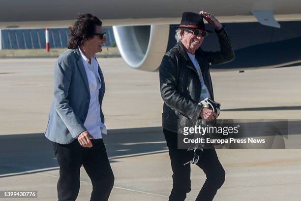 Ronnie Wood and Keith Richards of The Rolling Stones arrive at T4 of Adolfo Suarez Madrid-Barajas airport, on 26 May, 2022 in Madrid, Spain. The...