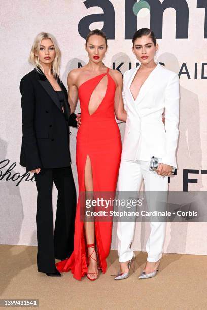 Stella Maxwell, Candice Swanepoel and Valentina Sampaio attending amfAR Gala Cannes 2022 at Hotel du Cap-Eden-Roc on May 26, 2022 in Cap d'Antibes,...