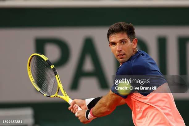 Federico Delbonis of Argentina plays a backhand against Andrey Rublev during the Men's singles Second Round on Day Five of the 2022 French Open at...