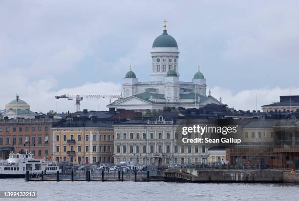 Helsinki Cathedral looms above Helsinki harbour on May 26, 2022 in Helsinki, Finland. Finland is facing a variety of difficulties stemming from...