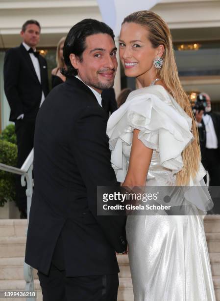 Petra Nemcova and Benjamin Larretche attend the amfAR Cannes Gala 2022 at Hotel du Cap-Eden-Roc on May 26, 2022 in Cap d'Antibes, France.