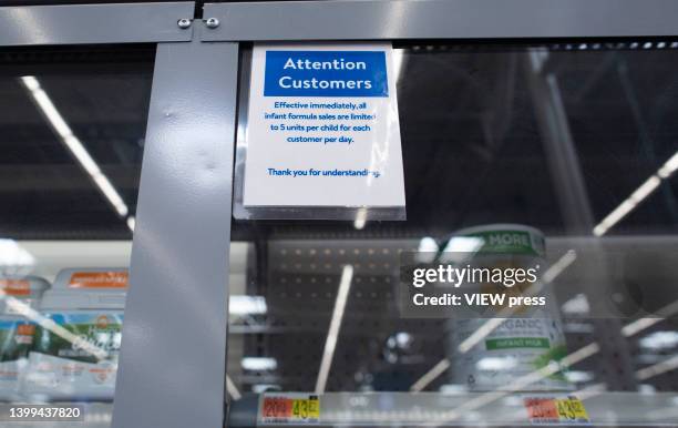 Warning sign is displayed as Shelves are empty at a Walmart store during a baby formula shortage on May 26, 2022 in North Bergen, NJ. A recent...