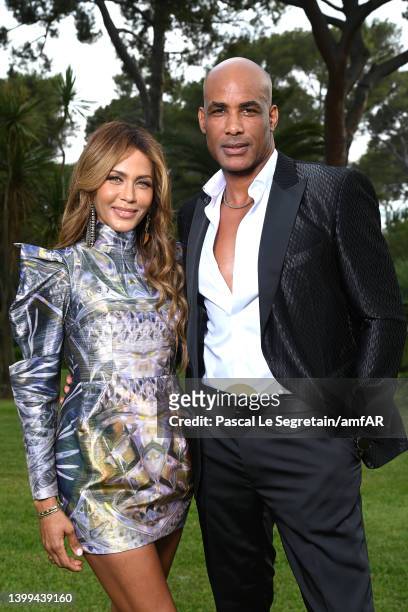 Nicole Ari Parker and Boris Kodjoe pose during the amfAR Cannes Gala 2022 at Hotel du Cap-Eden-Roc on May 26, 2022 in Cap d'Antibes, France.