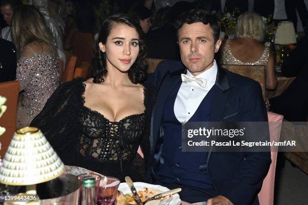 Caylee Cowan and Casey Affleck attend the amfAR Cannes Gala 2022 at Hotel du Cap-Eden-Roc on May 26, 2022 in Cap d'Antibes, France.