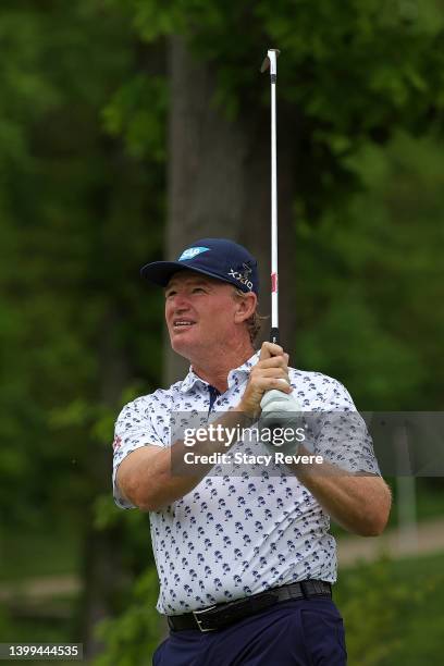 Ernie Els of South Africa watches his tee shot on the 11th hole during the first round of the Senior PGA Championship presented by KitchenAid at...
