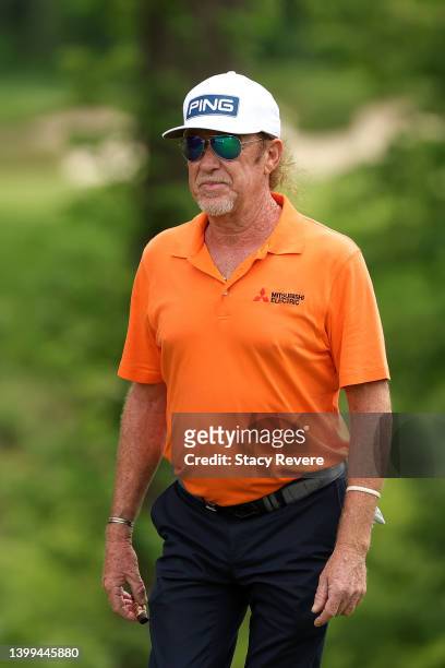 Miguel Angel Jimenez of Spain walks to the 11th tee during the first round of the Senior PGA Championship presented by KitchenAid at Harbor Shores...