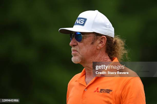 Miguel Angel Jimenez of Spain walks off of the 11th tee during the first round of the Senior PGA Championship presented by KitchenAid at Harbor...