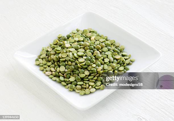 dried green lentils - green lentil stock pictures, royalty-free photos & images